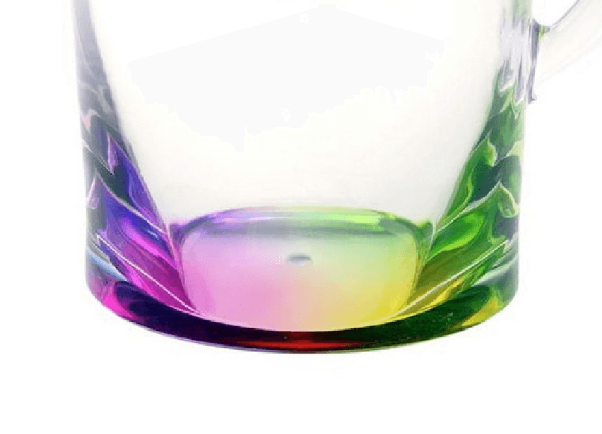 Detailed view of the colorful rainbow base of the BPA Free Drink Pitcher, adding a decorative touch to functional serveware.
