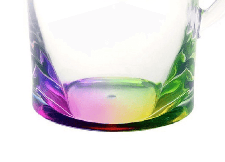 Detailed view of the colorful rainbow base of the BPA Free Drink Pitcher, adding a decorative touch to functional serveware.