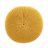 Yellow sponge with a textured surface on a white background