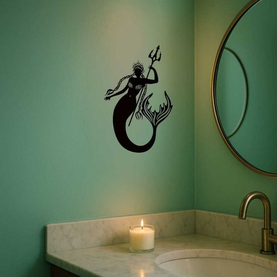 Mermaid Sea King Iron Relief Art mounted on teal bathroom wall above marble sink, ideal for coastal-themed home decor.