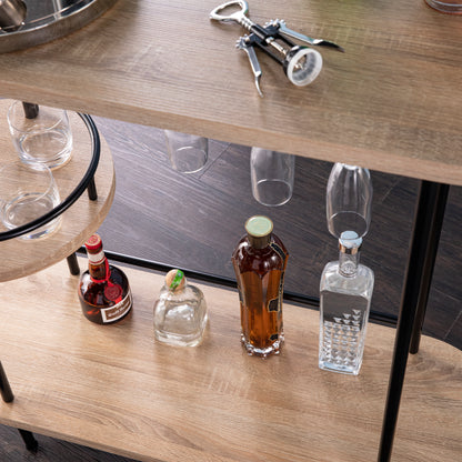 Close-up of Dagney Wine Bar Table Storage showing under-shelf glass holders and lower shelf with liquor bottles for organized drink storage.