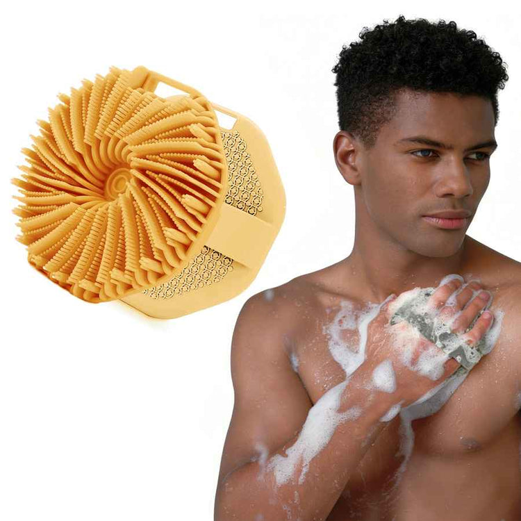 Man using a yellow scrubber on his arm with a close-up of the scrubber on a white background.