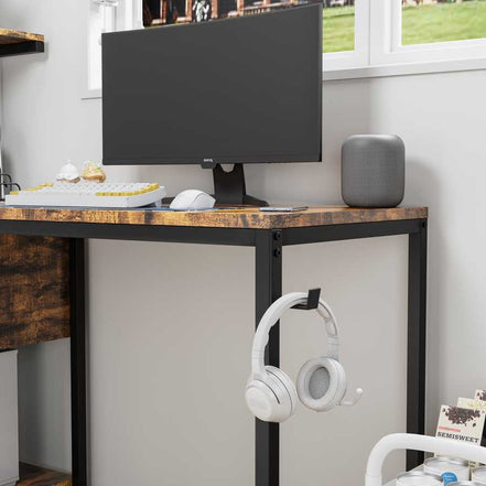 Side view of office desk with mounted headphone hook and minimalist design, showcasing power outlet integration and sturdy frame.