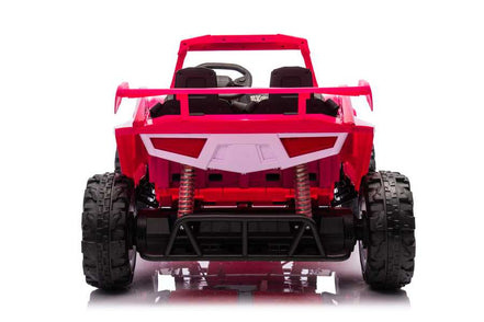 Side view of pink kids' off-road ride-on car with decals