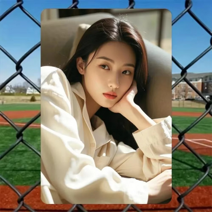 Beauty Themed Aluminum Wall Art - Stylish Home Decor featuring a serene woman in soft lighting, displayed against a baseball field fence backdrop.