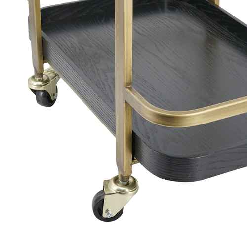 Close-up of black shelves and gold frame on metal bar cart with smooth-glide caster wheels for easy movement and style