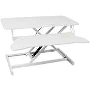 White adjustable standing laptop desk with keyboard tray in raised position. Ideal for ergonomic office setups and flexible workspaces.