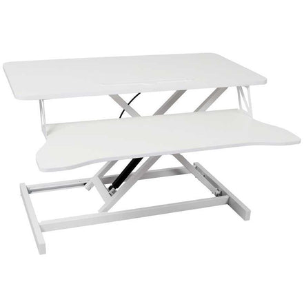 White adjustable standing laptop desk with keyboard tray in raised position. Ideal for ergonomic office setups and flexible workspaces.