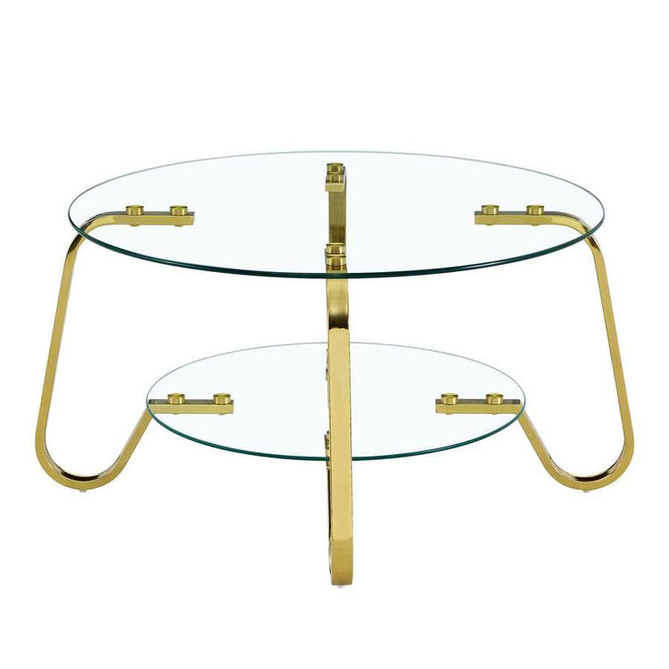 Front view of vintage metal coffee table with clear glass top and shelf, supported by stylish gold legs.