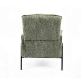 A single upholstered armchair shown from the back on a clean white studio background. The chair has a textured vertical ribbed fabric in a muted sage green with gray undertones, supported by slim black metal legs.