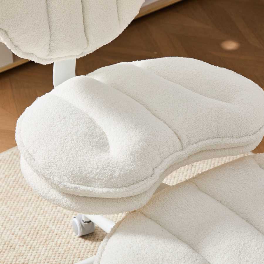 Close-up of the seat cushion on the Flexible Meditation Chair, showing thick padding and ergonomic shape for cross-legged sitting.