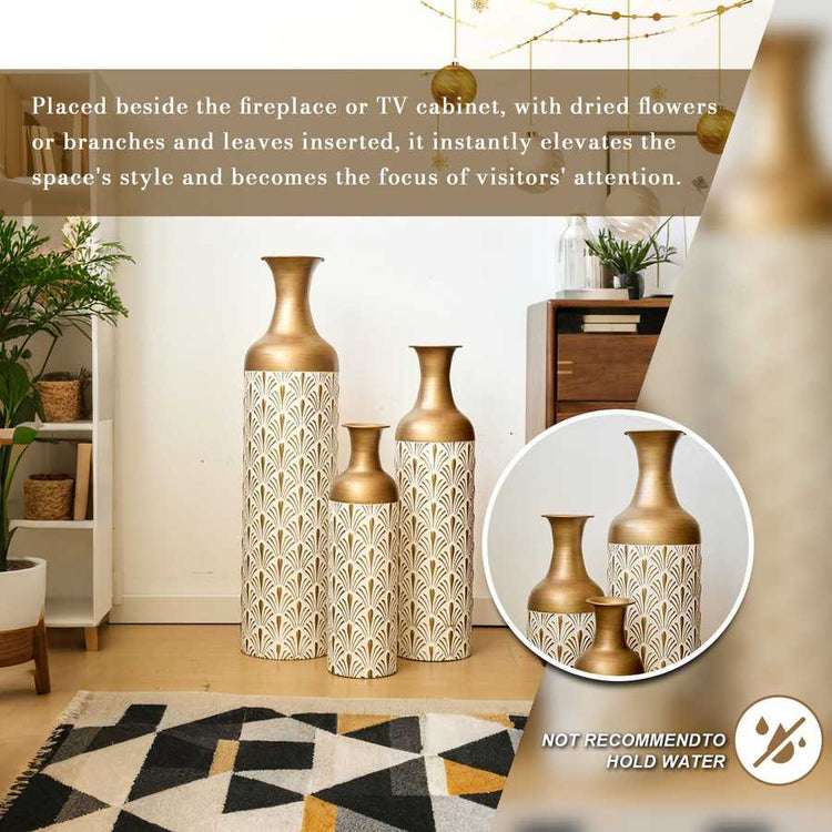 Decorative metal floor vases placed beside a rug and cabinet, styled with dried flowers for a warm, inviting home look.