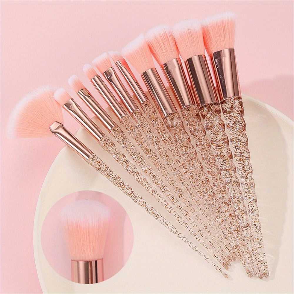 Detailed view of Pink Crystal Makeup Brushes featuring rose gold ferrules and fluffy pink bristles for professional cosmetic use.