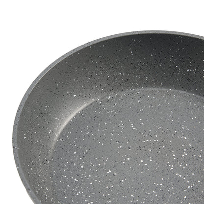 Close-up of interior speckled nonstick surface on aluminum frying pan from 3 piece skillet set.