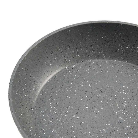 Close-up of interior speckled nonstick surface on aluminum frying pan from 3 piece skillet set.