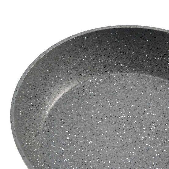 Close-up of interior speckled nonstick surface on aluminum frying pan from 3 piece skillet set.