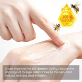 Hand applying cream to skin with a bee and honeycomb icon, indicating natural product.