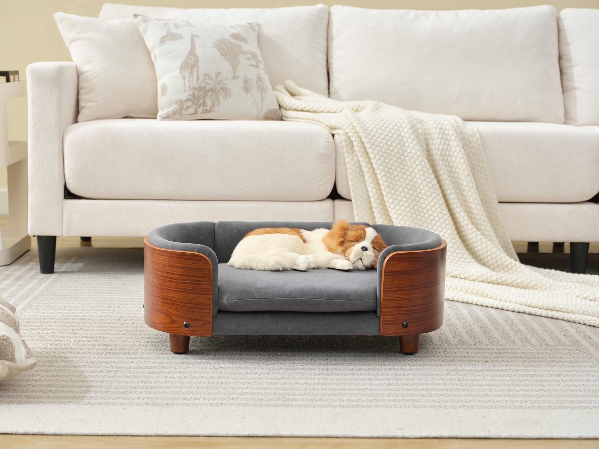 Luxury pet sofa with orthopedic velvet cushion and solid wood frame, designed for small dogs in Scandinavian-style homes.