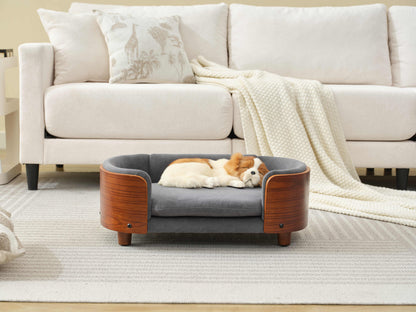 Luxury pet sofa with orthopedic velvet cushion and solid wood frame, designed for small dogs in Scandinavian-style homes.