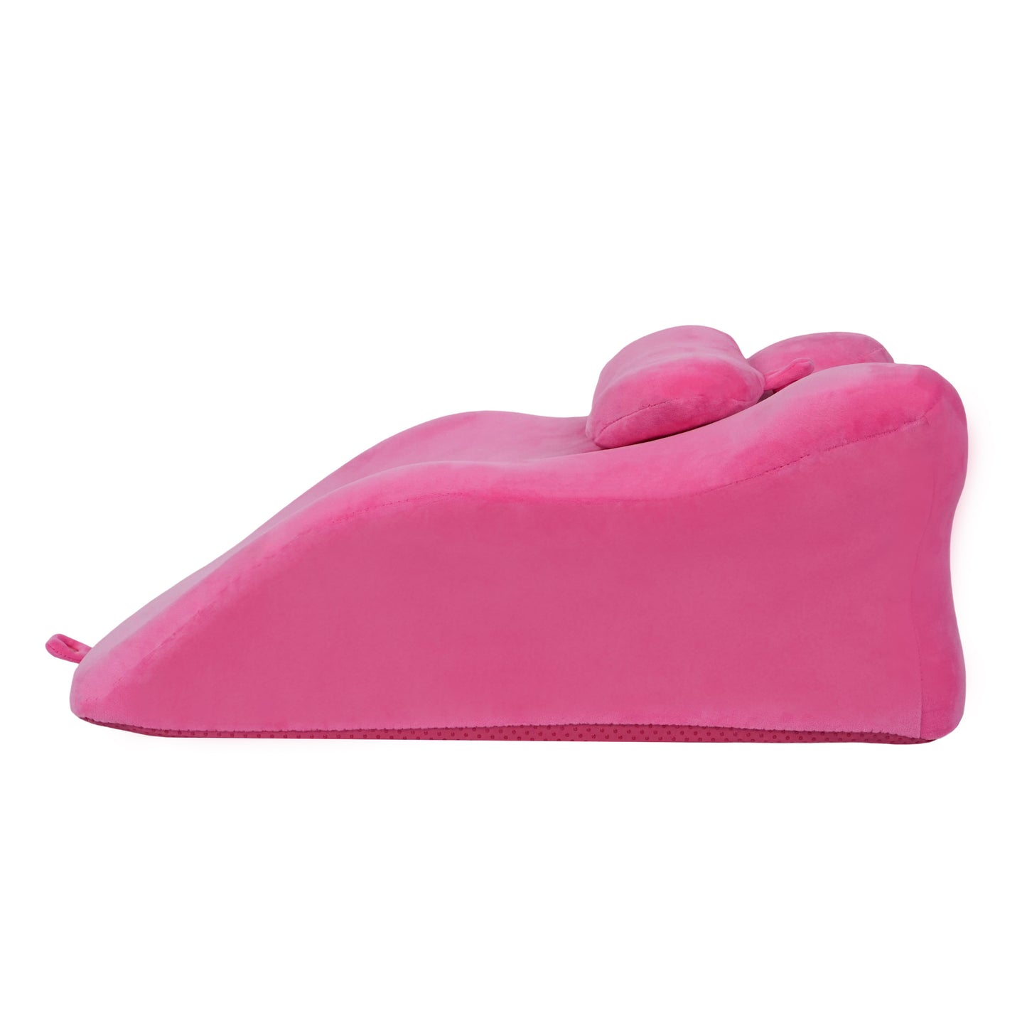 Side profile of pink ergonomic memory foam posture support pillow with contoured design for optimal back and lumbar support.