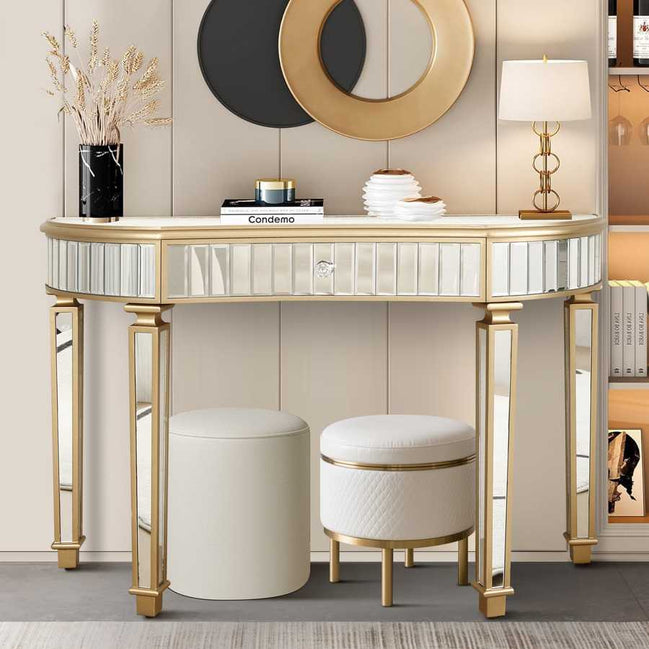 Half-Moon Mirrored Console Table with fluted glass and crystal knob drawer styled in an entryway with gold accents and modern decor.