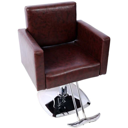 Top angle of 360° swivel salon chair showing thick seat padding and chrome footrest, ideal for hairdressing stations.