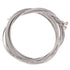 Coiled set of guitar strings on a white background