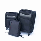Set of black suitcases and a backpack on a white background