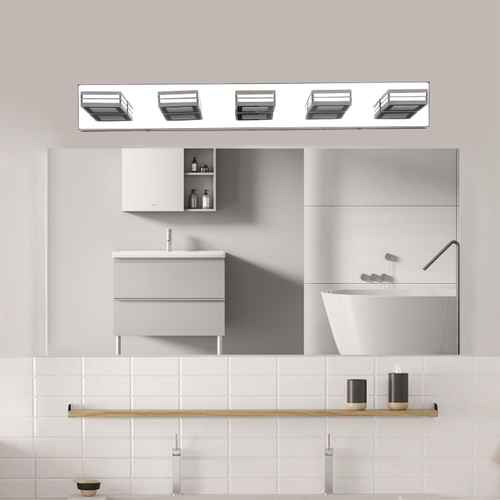 Bathroom setup with a large mirror above a sink, cabinets, and shelves.