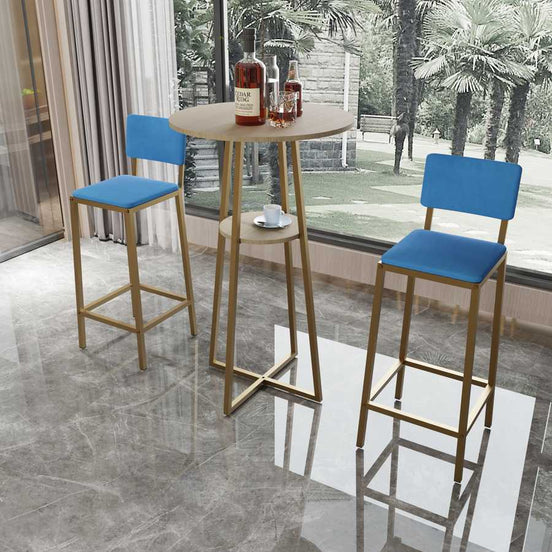 Elegant Bar Table Set for 2 with gold metal frame and blue cushioned stools, perfect for home bars or compact dining areas.