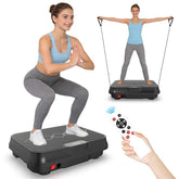 Woman doing yoga on vibration plate for home workouts