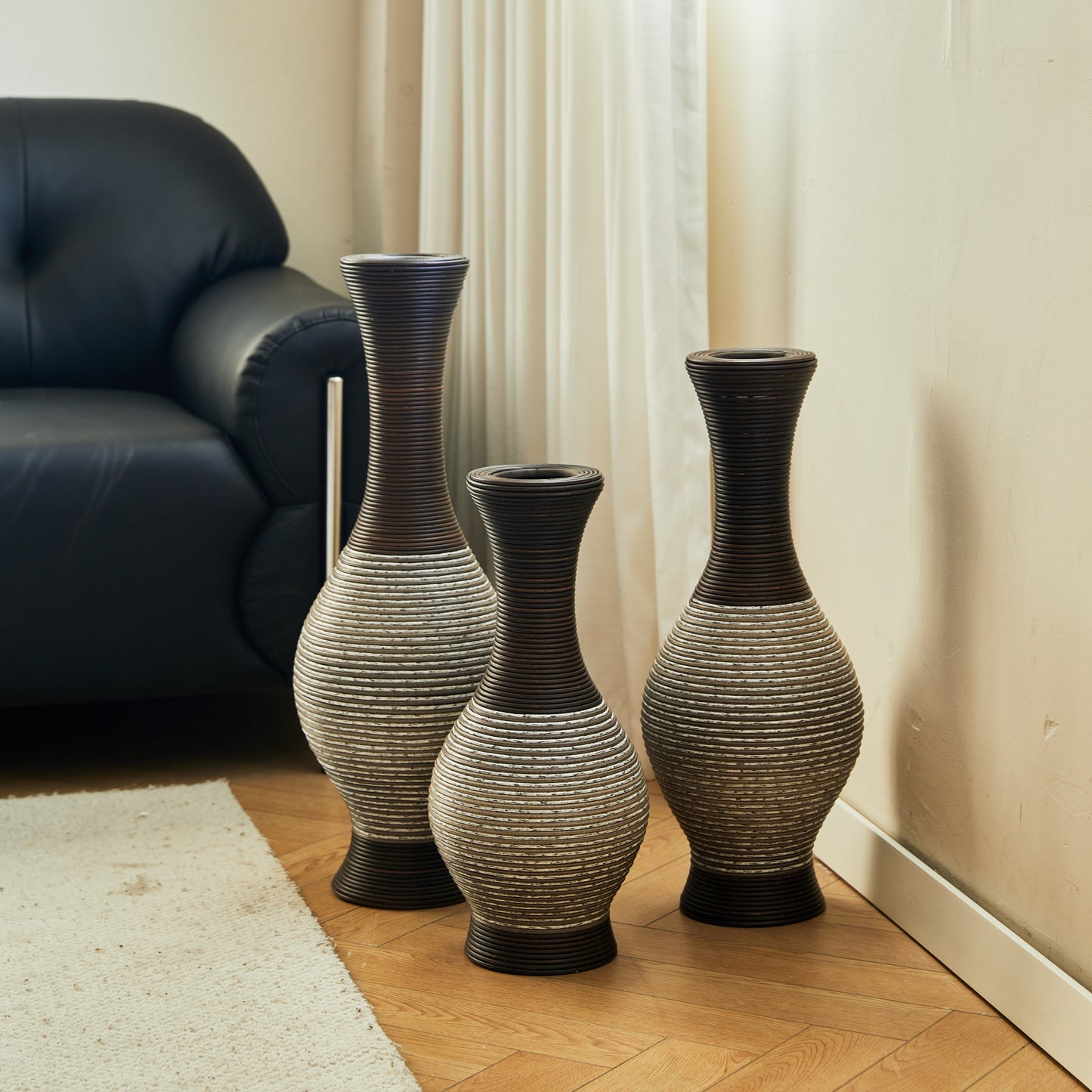 Set of 3 brown floor vases with ribbed texture placed near a wall and curtain, perfect for elegant home décor and flower display.