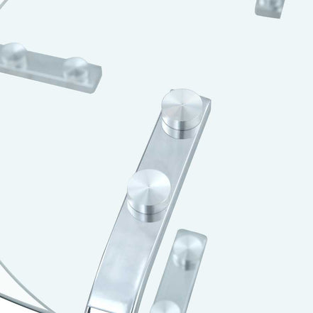Detailed view of metal connectors securing the glass top on the Vintage Metal Frame Glass Coffee Table 31.5''.