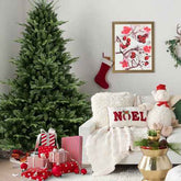 4 ft Christmas tree beside a white armchair