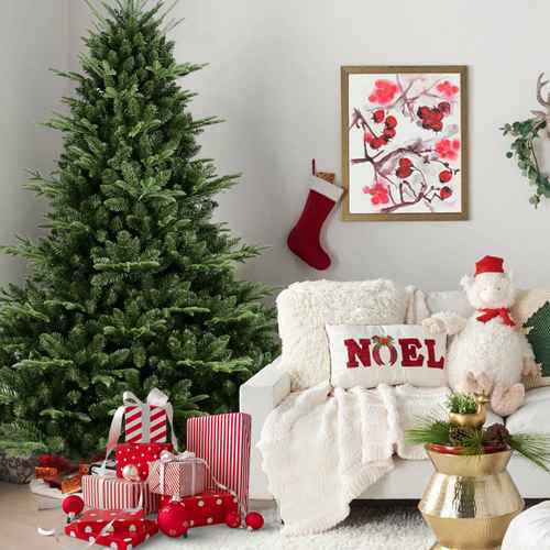 4 ft Christmas tree beside a white armchair