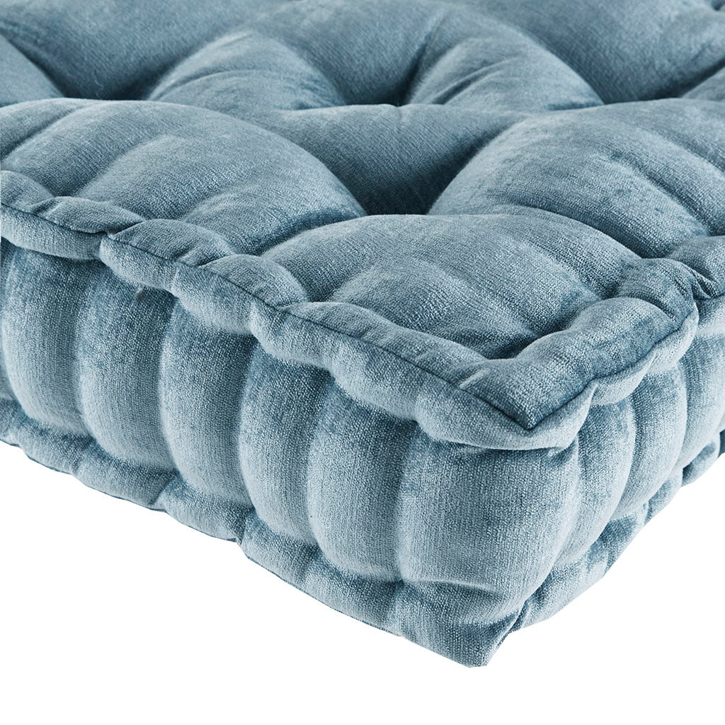 Blue textured cushion on a white background