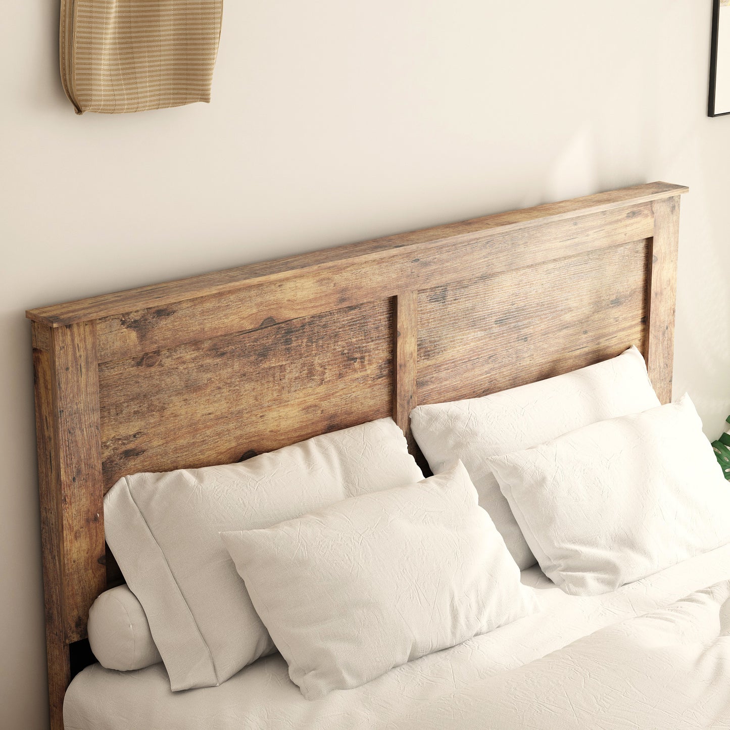 Close-up of rustic wood headboard on full size platform bed frame with white pillows, showcasing natural wood grain texture.
