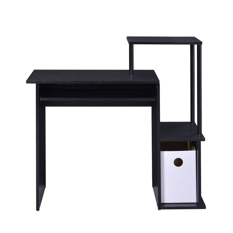 Close-up of black wood and metal computer desk with multiple surfaces and storage