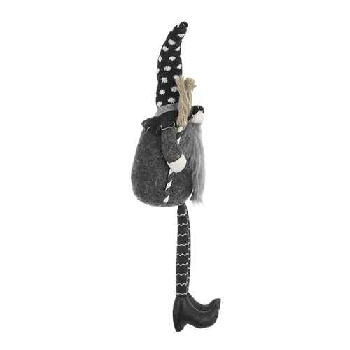 Side view of a black gnome Halloween figure with a tall polka dot hat, long striped legs, and cozy outfit, perfect for holiday decoration.
