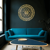 Gold Sacred Mandala Aluminum Wall Art by CIFbuy on a black wall above a teal sofa. Ideal for modern living room or meditation corner.