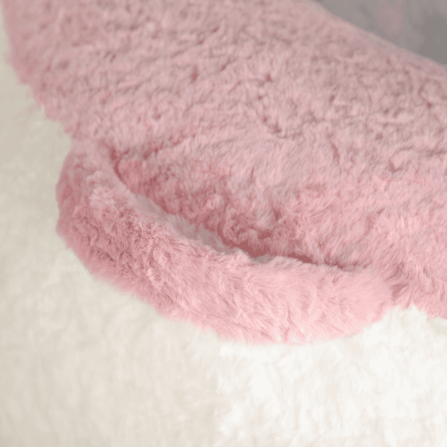 Close-up of pink and white fluffy fabric texture
