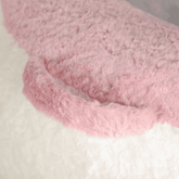 Close-up of pink and white fluffy fabric texture