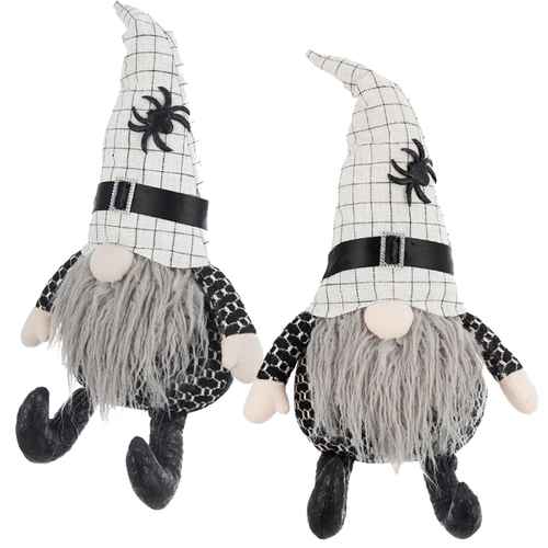 Two Halloween-themed gnomes with spider decorations on a white background