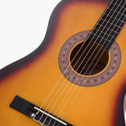 Close-up of classical guitar headstock with tuning pegs and detailed rosette