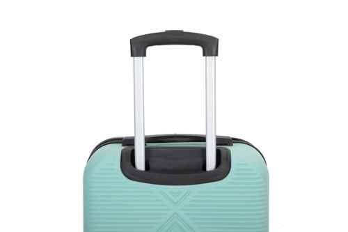 A close-up of a mint green hardshell suitcase with its telescoping handle extended, featuring a black handle grip and trim, set against a plain white background.