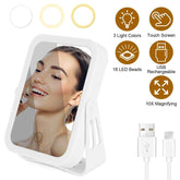 Lighted makeup mirror with USB cable on a white background