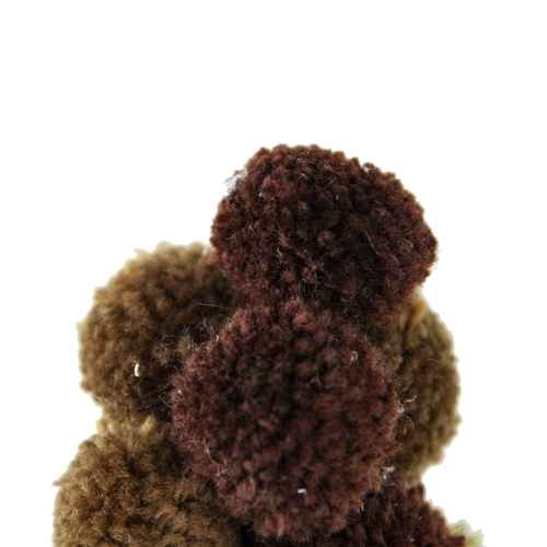 Christmas tree table decor pom-pom close-up
