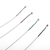 Close-up of wound violin strings with colorful winding for musical instrument accessories