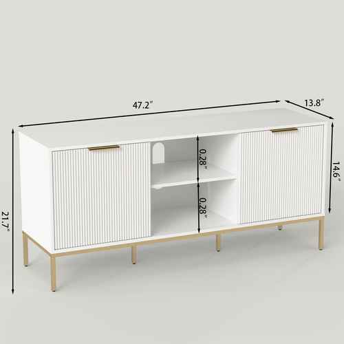 Living room with white modern TV stand featuring ribbed doors, gold handles, and decorative vases on top