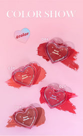 Four heart-shaped lip gloss tubes labeled 01